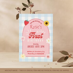 May include: A light blue and white gingham patterned invitation card with the text "Rosie's Berry First Birthday". The card features a strawberry, sunflower, and floral illustrations. The invitation includes the date, time, and RSVP information.