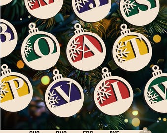 May include: Set of 12 Christmas ornament SVG cut files featuring letters of the alphabet J, M, O, A, T, S, P, V, W. Each ornament is a circle with a snowflake design and a letter in the center. The ornaments are in various colors, including red, blue, green, yellow, and purple.