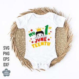 May include: White baby onesie with a graphic of a Black child wearing a crown and peeking over a banner that says "My 1st Juneteenth".