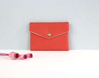 Marthe: little wallet made of orange cotton with golden button.