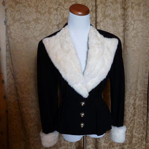 Black short jacket with fur trim