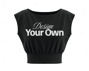 Pode incluir: Um top curto preto sem mangas com uma cintura larga e ajustada e um decote canoa. A parte frontal apresenta o texto branco "Design YOUR OWN" impresso numa combinação de um tipo de letra cursivo e um tipo de letra sem serifa em negrito.