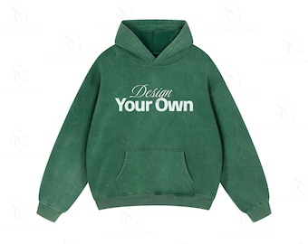Może przedstawiać: Zielona bluza z kapturem z przednią kieszenią i kapturem. Napis "Design Your Own" jest wydrukowany białym skryptem na piersi. Bluza ma długie rękawy i luźny krój.
