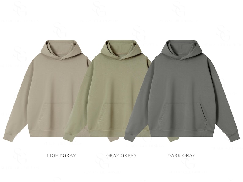 Pu&ograve; includere: Tre felpe con cappuccio a maniche lunghe dotate di una tasca a marsupio frontale e polsini a coste. Le felpe sono presentate in tre colori distinti etichettati come light gray, gray green e dark gray, con un design a tinta unita.