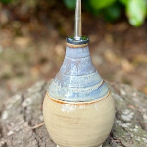 Handthrown blue and cream oil bottle
