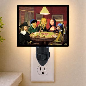 May include: A rectangular plug-in night light featuring a parody art print of famous historical figures playing poker around a round table. The scene includes figures resembling Rembrandt, Van Gogh, The Scream, Mona Lisa, and Girl with a Pearl Earring.