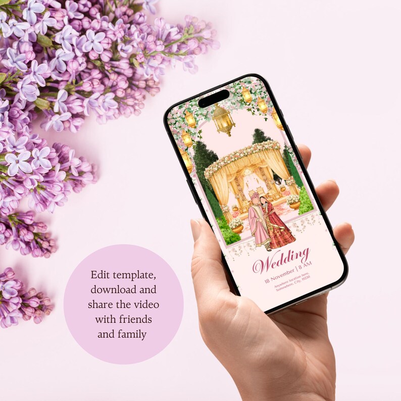 May include: A smartphone displays a wedding invitation with an illustration of a ceremony. The phone is held against a soft pink background with lilac flowers. Text on the phone reads "Wedding" and "Edit template, download and share the video with friends and family."