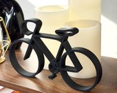 Elegant bicycle line art decor sculpture in modern home setting, thoughtful cycling gift for road cyclists, bike owners, and cycling lifestyle lovers.