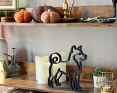 Shiba Inu decor statue with curled tail and pointed ears, modern black line art sculpture for dog lovers, Japanese dog-themed gift or home accent.
