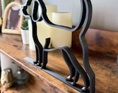 Full shelf view with the beagle sculpture as centerpiece. Black line art dog figure for bookshelf styling, modern living rooms, or as a meaningful gift for pet owners.