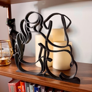 Dog Lover Mom minimalist sculpture styled on a shelf as modern home decor.