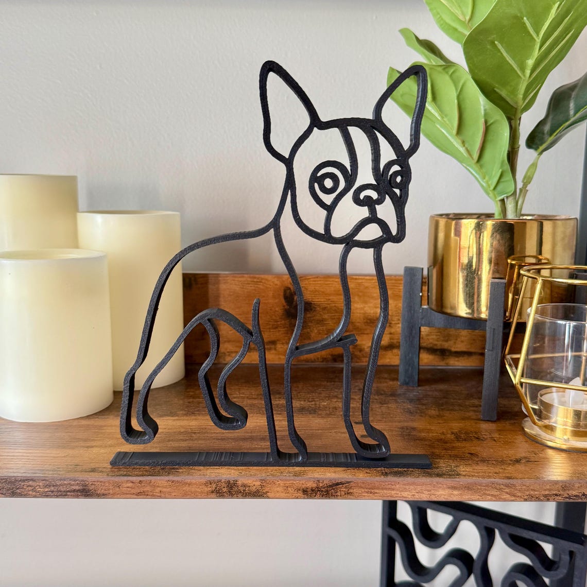 Full styled shot of Boston Terrier sculpture centered on a shelf. Minimalist dog decor in single line art design, perfect for gifting, bookshelf styling, or honoring a beloved pet.