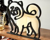 Black Chow Chow line art decor displayed on wooden shelf with soft candlelight, unique gift for Chow Chow lovers, dog moms, and dog dads.