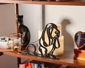 Close-up of the matte black PLA texture and clean line art details on the Basset Hound sculpture.