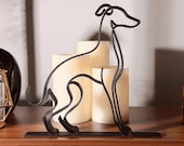 Custom Italian Greyhound line art sculpture displayed on a wooden shelf with softly glowing candles, featuring a minimalist black 3D printed silhouette and modern home décor.