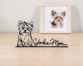 Yorkie Mom line art figurine on desk beside framed Yorkshire Terrier photo, thoughtful dog mom gift and tabletop decor