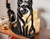 Alaskan Malamute minimalist sculpture styled on a shelf as modern home decor.