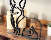 Minimalist Corgi silhouette shelf sitter in black, modern line art dog figurine for bookshelf, desk, or mantle decor.