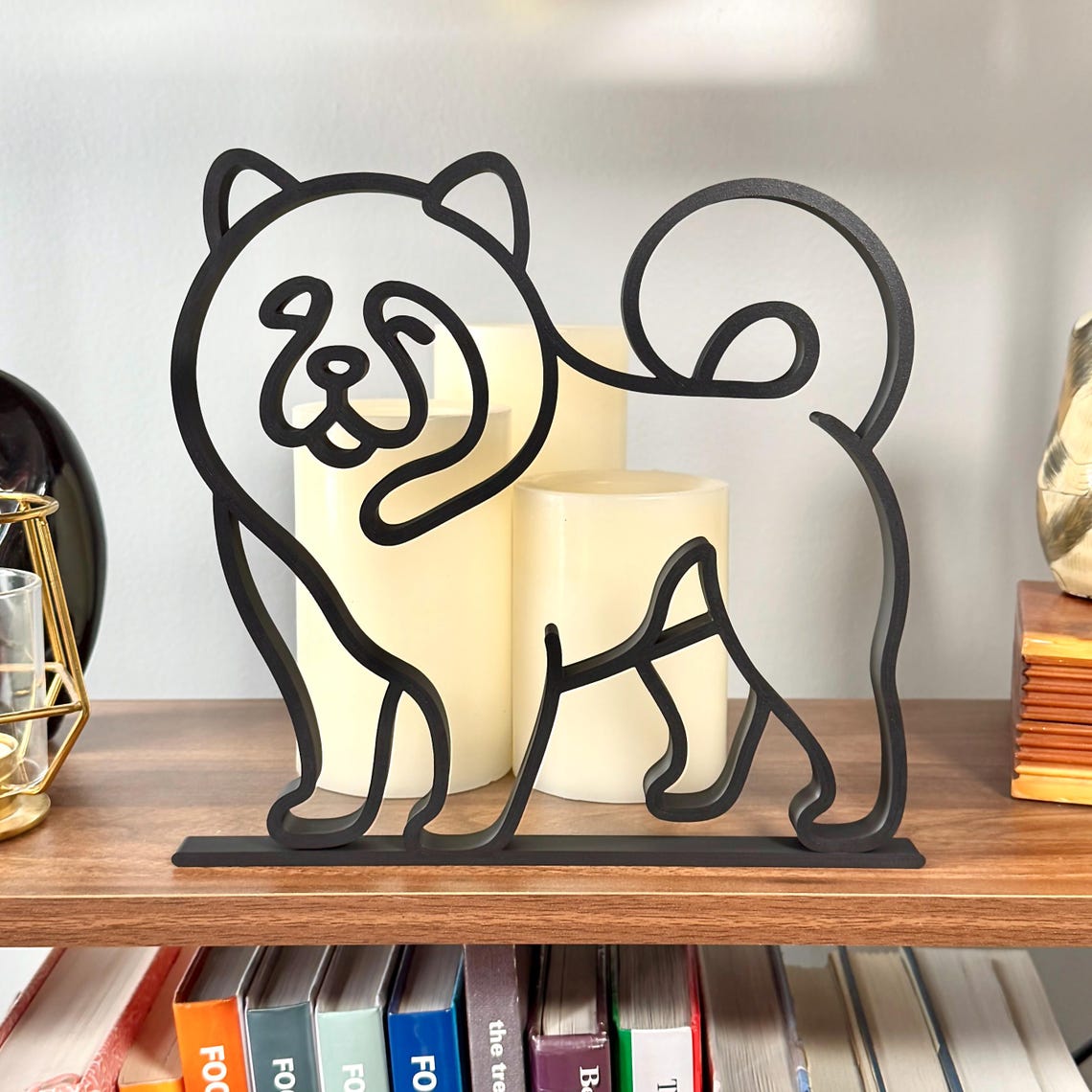 Minimalist black Chow Chow line art sculpture on a bookshelf with candles, modern dog decor gift for Chow Chow owners, chow moms, and chow dads.