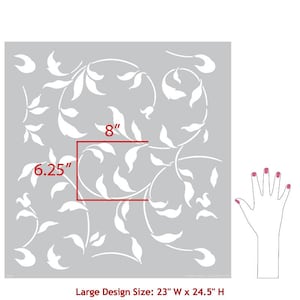 May include: A stencil with a repeating pattern of white leaves and vines on a gray background. The stencil is 23 inches wide and 24.5 inches high. The stencil is shown with a hand for scale.