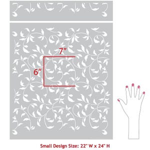 May include: A stencil with a repeating pattern of white vines and leaves on a gray background. The stencil is 22 inches wide and 24 inches high. The stencil is shown with a hand for size reference.