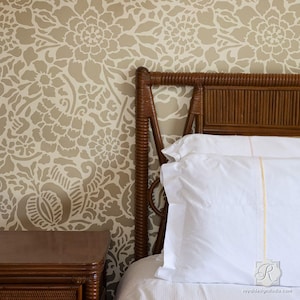 May include: A close-up of a bed with a brown wicker headboard and white bedding. The wall behind the bed is covered in a beige floral wallpaper pattern.