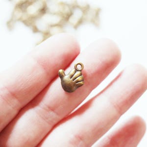 36 ct Antique Vintage Bronze Alloy Hand Charm Pendant Wholesale Lot for Jewelry Making image 4