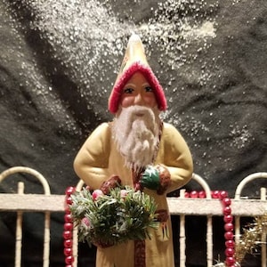 CHALKWARE Father Christmas Santa with an over the shoulder basket of Pine and Berries