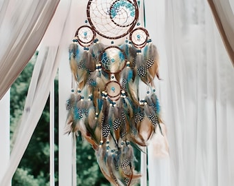 Łapacz snów w kolorze turkusowym: dekoracja sypialni w stylu boho