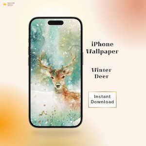 May include: An iPhone displaying a winter-themed wallpaper featuring a deer in a snowy landscape. The phone is black with a screen that shows a watercolor painting of a deer with antlers. Text on the right says "iPhone Wallpaper", "Winter Deer", and "Instant Download".