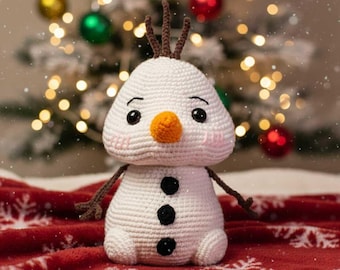 Patrón de crochet amigurumi de muñeco de nieve congelado: muñeco de peluche navideño con forma de bola de nieve gigante (PDF), ideal para principiantes.