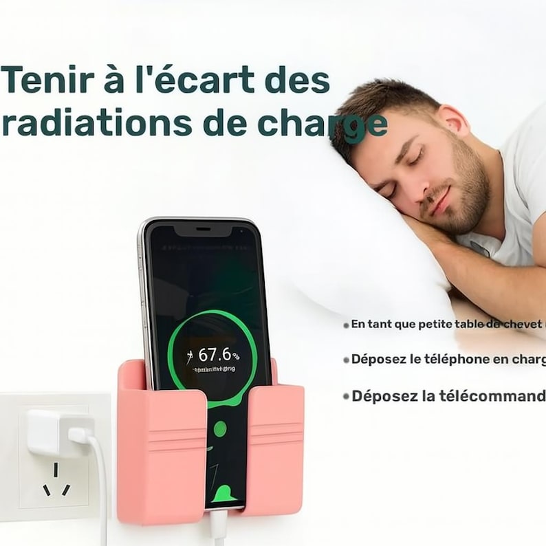 May include: A pink phone holder with a smartphone charging. The phone displays a charging status of 67.6%. The text on the image says "Keep away from charging radiation". A white charger is plugged into a wall outlet.