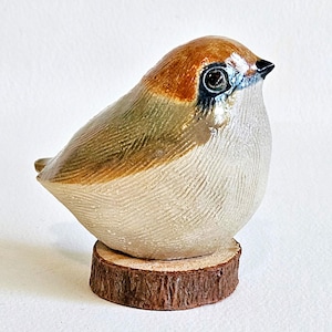 ceramic bird figurine
