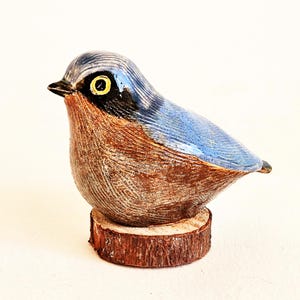 pottery bird figurine