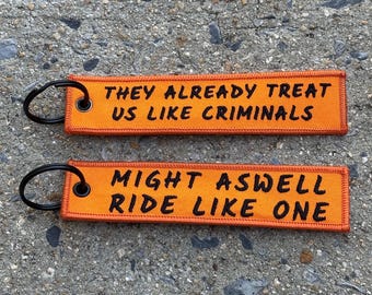 They Treat Us Like Criminals Jet Tag Keychain, Embroidered Keychain, Double Sided, Biker Keychain