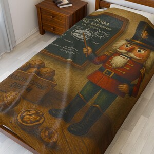 May include: A bedspread featuring a whimsical illustration of a nutcracker in a red coat and black boots, standing before a chalkboard with a brain diagram. A wooden box of walnuts and cracked walnuts are also depicted.