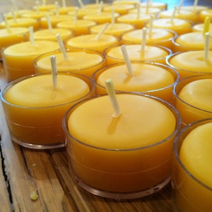 Beeswax Candles -Set of 100 Natural Beeswax Tea Lights in clear plastic cups