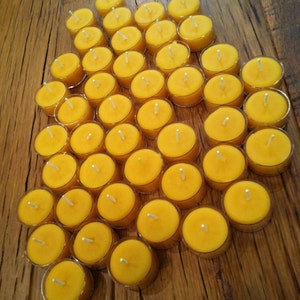 Beeswax Candles Set of 100 Natural Beeswax Tea Lights in clear plastic cups image 2