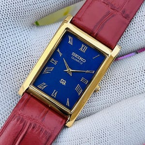 Klasyczny zegarek kwarcowy Seiko Slim Tank z niebieską tarczą rzymską – odnowiony, unisexowy, klasyczny zegarek wizytowy