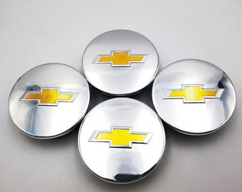 Chevrolet 4 x 68 mm Coprimozzi cromati Set di 4 pezzi OEM 23115617 Cerchioni Chevy di ricambio Emblemi Logo Nuovo
