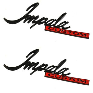 May include: Two black Impala emblems with a red "CUSTOM" accent. The Impala script is in a cursive font. The "CUSTOM" text is in a rectangular red box.