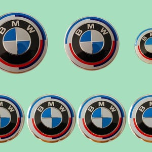 BMW 7pcs 50th Anniversary 82mm Front 74mm Rear 45mm Steering 4x56mm Wheel Caps Blue and White Badges Set of 7 Emblems Centre Caps New