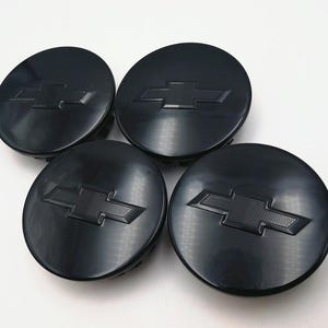 Lot de 4 enjoliveurs de centre de roue Chevrolet, noir brillant, 4 x 68 mm, pièce OEM 23115617, logo emblème de roue de rechange Chevrolet, neuf