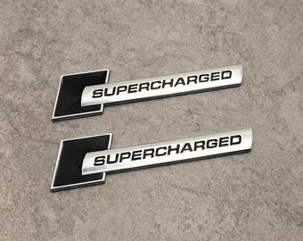 Audi 2pcs Black\Silver Audi Supercharged Side Fender Emblem Badge Left and Right OEM style and Easy Install New Item