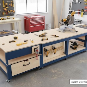 May include: A large, modular woodworking workbench with a light wood surface and dark blue frame. It features built-in storage, a drawer, and various power tools, including a mitre saw and table saw. The workbench is on wheels.