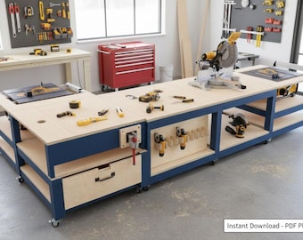 May include: A large, modular woodworking workbench with a light wood surface and dark blue frame. It features built-in storage, a drawer, and various power tools, including a miter saw and table saw. The workbench is on wheels.