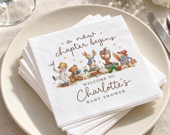 May include: A stack of white paper napkins featuring the text 'a new chapter begins' and 'WELCOME TO Charlotte's BABY SHOWER'. The design includes watercolor illustrations of a rabbit, teddy bear, duck, monkey, and squirrel with books.