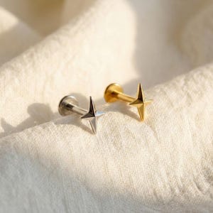 Piercing a stella a quattro punte in titanio 16G, stella polare solida con parte posteriore piatta, orecchino minimalista a conchiglia con elica e trago, piccolo piercing al naso e labret