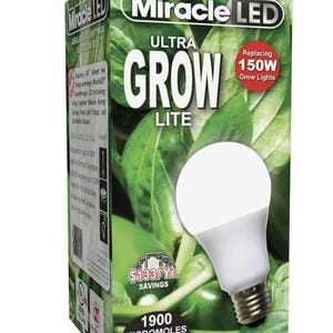 May include: A Miracle LED Ultra Grow Lite bulb with a white and silver base. The packaging features green leaves and text that reads "Ultra Grow Lite", "Replacing 150W Grow Lights", and "1900 Micromoles Indoor Growing Power!"