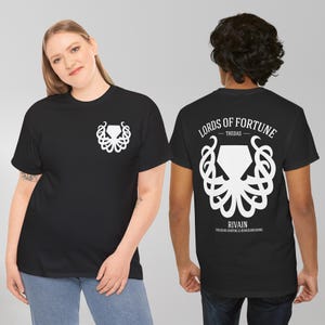 May include: Black t-shirts featuring a white octopus and geometric design. The front has a small logo. The back of the shirt displays the text "LORDS OF FORTUNE" and "RIVAIN TREASURE HUNTING & DUNGEONEERING".